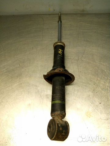 Стойка амортизатора задняя правая Mitsubishi