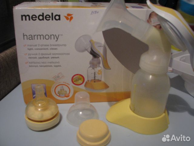 Молокоотсос Medela ручной б/у + соска Calma