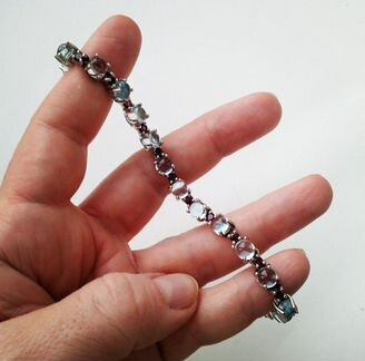 Серебряный украшения с голубыми топазами