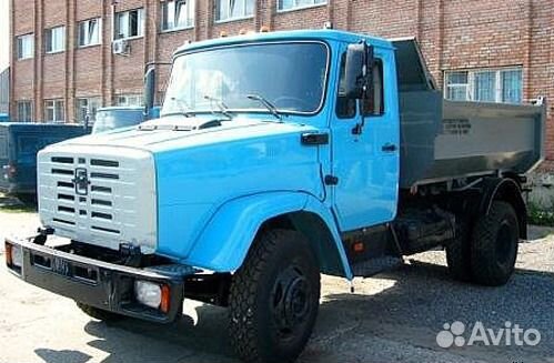 Водитель самосвала камаз