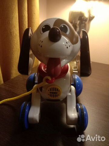Tomy Музыкальная Игрушка-каталка