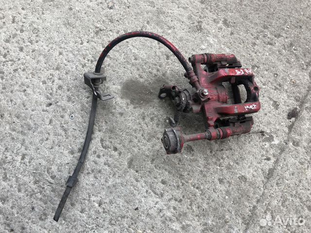 Суппорт задний правый opel astra J cruze мех ручни