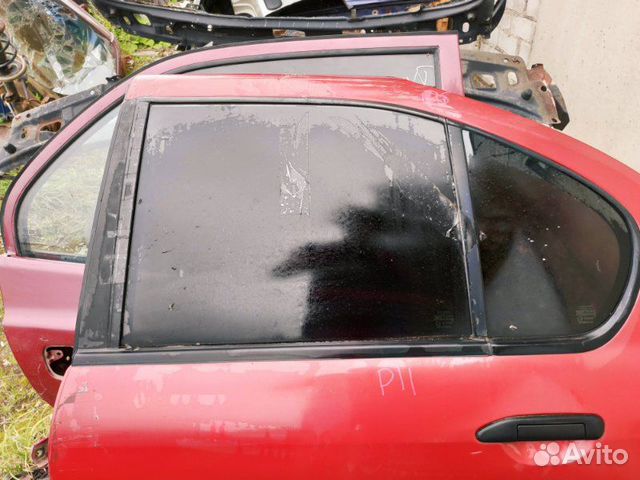 Стекло дверное заднее левое Nissan Primera P11
